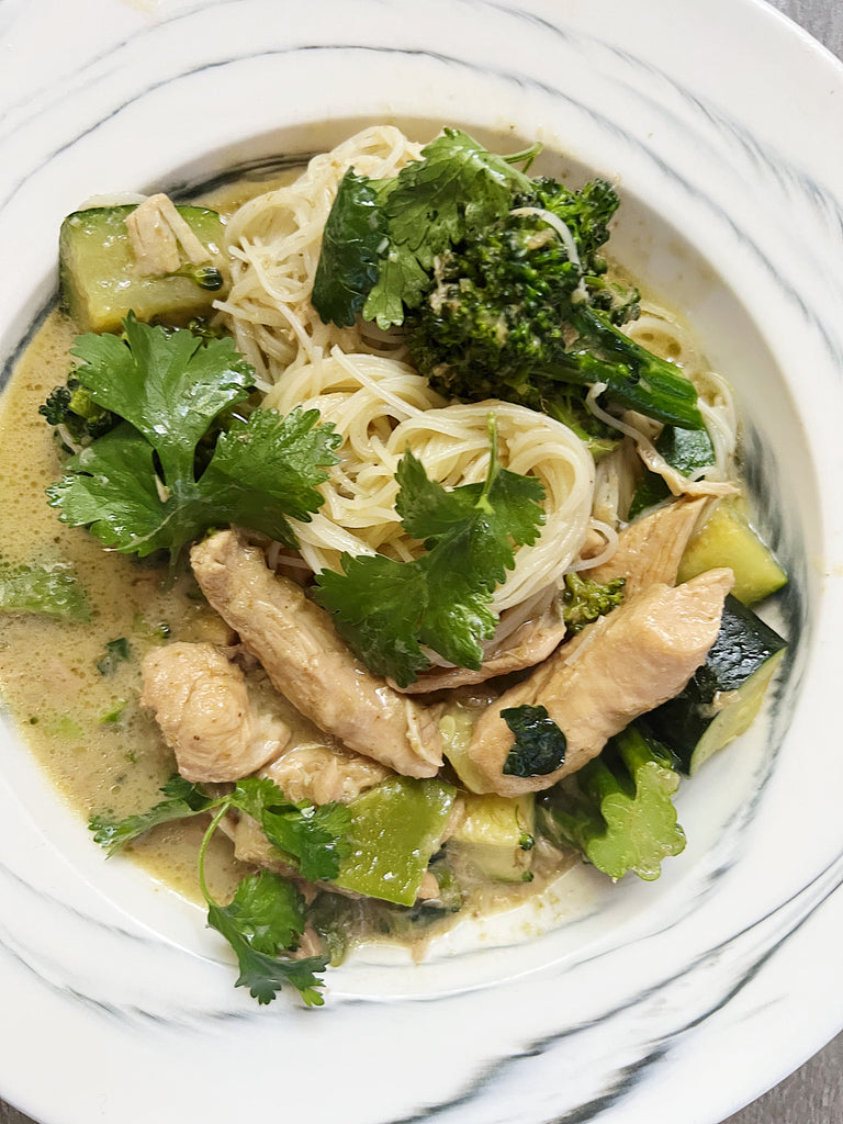 Green chicken curry with greens and noodles