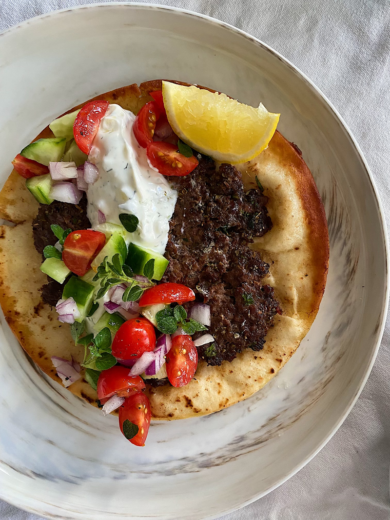 Beef pita with chopped Greek salad and tzatziki