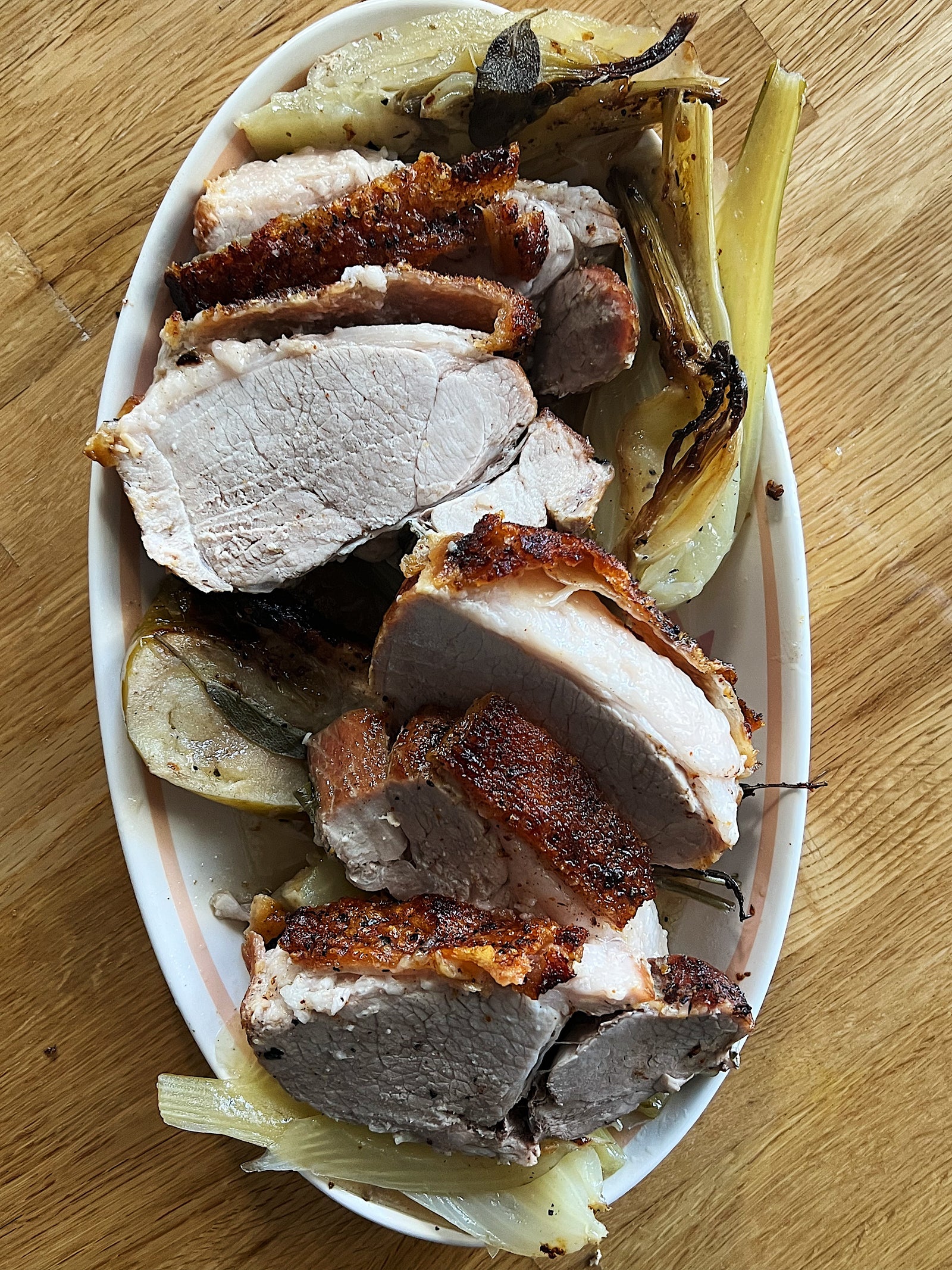 Pork leg with roasted apples and fennel