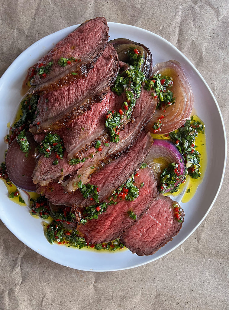 Roasted Beef Rump Cap and Onions with Basil Chimichurri